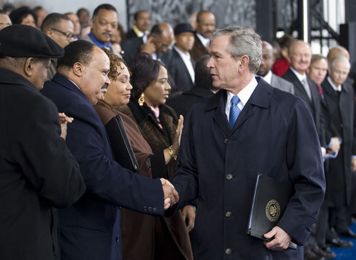 President George W. Bush greets Martin Luther King III and his sisters, Yolanda Denise King and Bernice Albertine King, Monday, Nov. 13, 2006, following President Bush’s speech at the groundbreaking ceremony for the Martin Luther King Jr. National Memorial on the National Mall in Washington, D.C. White House photo by Eric Draper