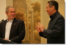 President George W. Bush and Prime Minister Lee Hsien Loong of Singapore deliver remarks during a dinner Thursday, November 16, 2006. The President congratulated the people of Singapore "for being such a vivid example of enterprise and markets and hard work."  White House photo by Shealah Craighead