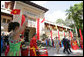 President George W. Bush and Mrs. Laura Bush are greeted upon their visit Monday, Nov. 20, 2006, to the the Ho Chi Minh City History Museum. White House photo by Shealah Craighead