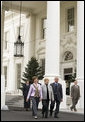 Mrs. Laura Bush walks with Margaret and Francis Botek of Lehighton, Pa., during the arrival of the official White House Christmas tree on the North Portico Monday, Nov. 27, 2006. The Botek family owns Crystal Springs Tree Farm and donated the 18-foot Douglas fir tree. White House photo by Shealah Craighead