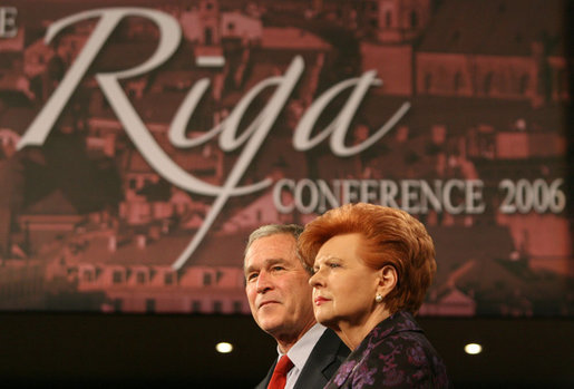 President George W. Bush and President Vaira Vike-Freiberga of Latvia, deliver remarks Tuesday, Nov. 28, 2006, in the Grand Hall of Latvia University in Riga. President Bush thanked President Vike-Freiberga for hosting the NATO summit and said, "I appreciate very much your strong belief that liberty has got the capacity to transform the world for the good." White House photo by Eric Draper