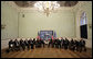 President George W. Bush, center left, meets with NATO Secretary General Jaap de Hoop Scheffer, center right, inside Latvia University Tuesday, Nov. 28, 2006, in Riga. White House photo by Eric Draper