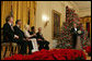 President George W. Bush speaks during a reception for the Kennedy Center honorees in the East Room Sunday, Dec. 3, 2006. They are, from left: musical theater composer Andrew Lloyd Webber; conductor Zubin Mehta; country singer Dolly Parton; singer and songwriter William "Smokey" Robinson; and film director Steven Spielberg. White House photo by Shealah Craighead