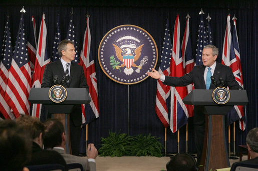 President George W. Bush responds to a question during a joint news conference with British Prime Minister Tony Blair, Thursday, Dec. 7, 2006, in the Dwight D. Eisenhower Executive Office Building. 