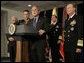 President George W. Bush listens to a reporter’s question following his meeting on Iraq with U.S. military leaders at the Pentagon, Wednesday, Dec. 13, 2006, joined by from left, Vice President Dick Cheney; Chairman of the Joint Chiefs of Staff, General Peter Pace and Vice Chairman of the Joint Chiefs of Staff Admiral Edmund P. Giambastiani, right. White House photo by Eric Draper