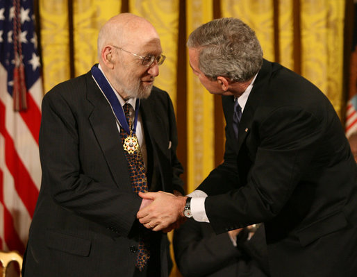 President George W. Bush congratulates Dr. Joshua Lederberg after presenting him with the 2006 Presidential Medal of Freedom Friday, Dec. 15, 2006, during ceremonies at the White House. Said the President, "Joshua Lederberg has always seemed ahead of his time. For his brilliant career, his high ethical standards, and his many contributions to our country, the United States thanks Dr. Joshua Lederberg." White House photo by Eric Draper