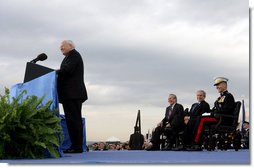 President George W. Bush, Secretary of Defense Donald Rumsfeld, and Chairman of the Joint Chiefs of Staff General Peter Pace laugh as Vice President Dick Cheney makes a joke during his remarks at the Armed Forces Full Honor Review in Honor of Secretary of Defense Donald Rumsfeld at the Pentagon, Friday, December 15, 2006.  White House photo by David Bohrer