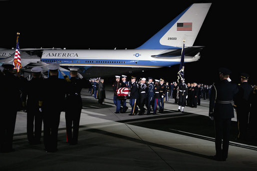 A military honor guard carries the casket of former President Gerald R. Ford upon arrival to Andrews Air Force Base in Maryland for the State Funeral ceremonies at the U.S. Capitol, Saturday, December 30, 2006. White House photo by David Bohrer