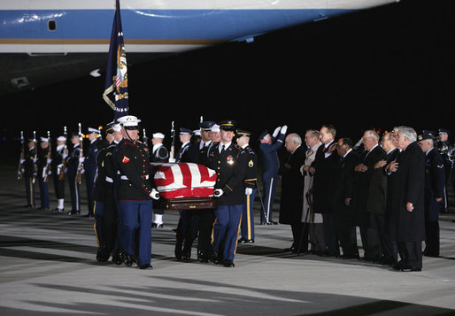 Vice President Dick Cheney leads the group of honorary pallbearers in saluting the casket of former President Gerald R. Ford upon its arrival at Andrews Air Force Base in Maryland, Saturday, December 30, 2006, for the State Funeral ceremonies at the U.S. Capitol. White House photo by David Bohrer