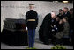 Vice President Dick Cheney presents the flag that draped the casket of former President Gerald R. Ford to former first lady Betty Ford during interment ceremonies at the Gerald R. Ford Presidential Museum in Grand Rapids, Mich., Wednesday, January 3, 2007. White House photo by David Bohrer