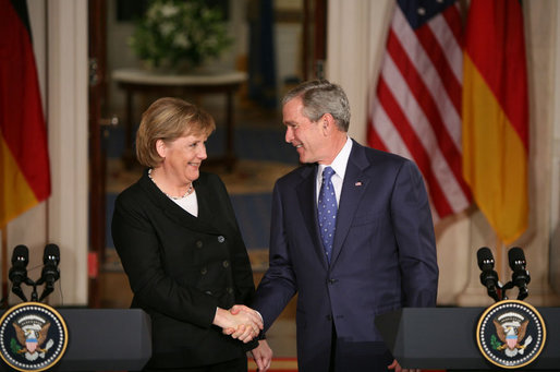 President George W. Bush and German Chancellor Angela Merkel shake hands at the conclusion of their joint news conference at the White House, Thursday, Jan. 4, 2006. White House photo by Paul Morse