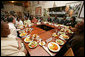 Mrs. Laura Bush meets with teenagers and staff during a lunch and roundtable discussion at the Cafe Reconcile, Tuesday, Jan. 9, 2007, in New Orleans, Louisiana, a program offering teens life skills and a working education to help them successfully enter the workforce and become productive adults. White House photo by Shealah Craighead