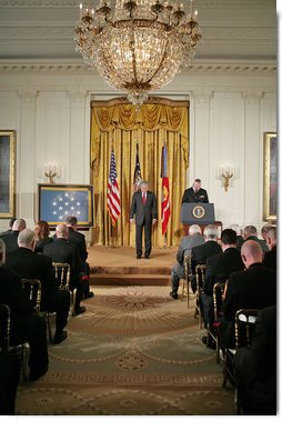 President George W. Bush bows his head before a Medal of Honor ceremony for Corporal Jason Dunham of the Marine Corps in the East Room Thursday, Jan. 11, 2007. "Since World War II, more than half of those who have been awarded the Medal of Honor have lost their lives in the action that earned it. Corporal Jason Dunham belongs to this select group. On a dusty road in western Iraq, Corporal Dunham gave his own life so that the men under his command might live. This morning it's my privilege to recognize Corporal Dunham's devotion to the Corps and country -- and to present his family with the Medal of Honor," said the President. White House photo by Paul Morse