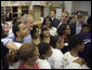 President George W. Bush spends time with volunteers during Martin Luther King, Jr. Day at Cardozo Senior High School in Washington, D.C., Monday, Jan. 15, 2007. "One of the things that Mrs. King wanted was for MLK Day to be a day of service. It is not a day off, but it's a day on," said the President. "And so I'm here at Cardozo High School to thank the hundreds of people who have showed up to serve the country by volunteering." White House photo by Paul Morse