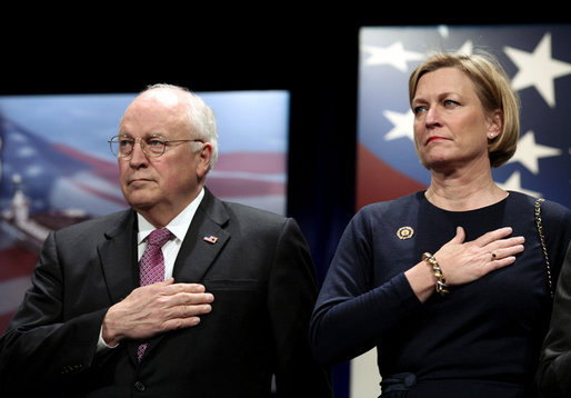 Vice President Dick Cheney stands with Susan Ford Bales, daughter of former President Gerald R. Ford, while the U.S. national anthem is played during the naming ceremony for the new U.S. Navy aircraft carrier, the USS Gerald R. Ford, at the Pentagon in Washington, D.C., Tuesday, Jan. 16, 2007. The nuclear-powered vessel will go into service in 7-8 years and will be the first in the new Gerald R. Ford class of aircraft carriers in the U.S. Navy. White House photo by Paul Morse