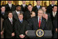 President George W. Bush talks about the 2006 World Series Champions, The St. Louis Cardinals, in the East Room Tuesday, Jan. 16, 2007. “They say in baseball in order to become the World Series champ, you can't have losing streaks of over two or three games.,” said the President. “This club had losing streaks of -- one eight-game losing streak; another eight-game losing streak; and a seven-game losing streak -- which really speaks to the character of the baseball team, doesn't it?” White House photo by Paul Morse