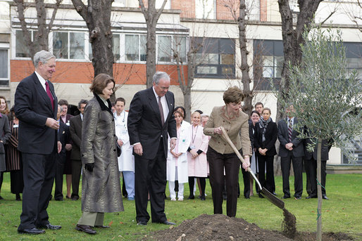 Mrs. Laura Bush plants an olive tree during her visit to the American Hospital of Paris Tuesday, Jan. 16, 2007, in Neuilly-on-Seine, France. Mrs. Bush is in France for a three-day visit to Paris. White House photo by Shealah Craighead