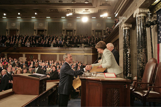 President George W. Bush greets Speaker of the House Nancy Pelosi before delivering his State of the Union Address at the U.S. Capitol Tuesday, Jan. 23, 2007. White House photo by Eric Draper