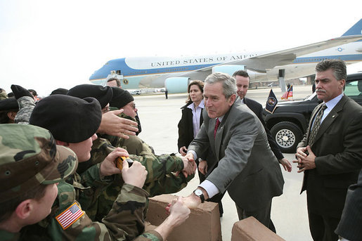 President George W. Bush greet National Guard personnel at New Castle Airport., Wednesday, Jan. 24, 2007. White House photo by Paul Morse