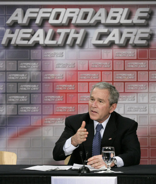 President George W. Bush gestures as he participates in a roundtable discussion on health care initiatives at the Saint Luke’s-Lee’s Summit hospital in Lee’s Summit, Mo., Thursday, Jan 25, 2007. White House photo by Eric Draper