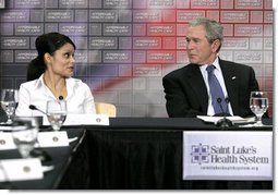 President George W. Bush speaks with Esmerelda Wergin, who works as a waitress in Overland Park, Mo., about how hard it is to maintain insurance for her family during a roundtable discussion on health care initiatives at the Saint Luke’s-Lee’s Summit hospital in Lee’s Summit, Mo., Thursday, Jan 25, 2007. Under the new health care initiatives offered in President Bush’s State of the Union address, Wergin would save over two thousand dollars, making insurance for her family more attainable. White House photo by Eric Draper