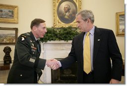 President George W. Bush welcomes Army General David Petraeus, incoming Commander of the Multi-National Force-Iraq, Friday, Jan. 26, 2007, to the Oval Office. White House photo by Eric Draper