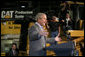 President George W. Bush gestures as he speaks to workers at Caterpillar Inc. in East Peoria, Ill., Tuesday, Jan. 30, 2007, on the strength of the U.S. economy. White House photo by Paul Morse