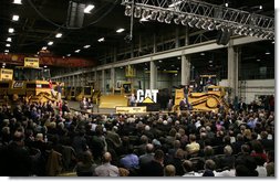 President George W. Bush speaks to workers at the Caterpillar Inc. facility in East Peoria, Ill., Tuesday, Jan. 30, 2007, on the strength and continued growth of the U.S. economy. White House photo by Paul Morse