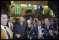 President George W. Bush tosses a baseball in the air as he greets traders Wednesday, Jan. 31, 2007, on the floor of the New York Stock Exchange. The unscheduled visit marked only the second visit by a sitting president during regular Exchange hours. White House photo by Paul Morse