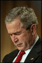 President George W. Bush bows his head in prayer at the National Prayer Breakfast in Washington, D.C., Thursday, Feb. 1, 2007. White House photo by Eric Draper