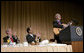 President George W. Bush and Representative Emanuel Cleaver, D-Mo., listen to Dr. Francis Collins during the National Prayer Breakfast in Washington, D.C., Thursday, Feb. 1, 2007. Dr. Collins is the director of the National Human Genome Research Institute. White House photo by Eric Draper