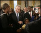 President George W. Bush meets with New York City subway hero Wesley Autrey, left, and members of the Autrey family, in the East Room of the White House, Monday, Feb. 12, 2007, during the celebration of African American History Month. White House photo by Eric Draper