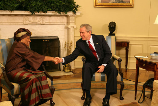 President George W. Bush greets Liberia's President Ellen Johnson-Sirleaf during her visit Wednesday, Feb. 14, 2007, to the White House. President Bush applauded the leader's confidence and deep concern for the people of Liberia, saying, "I thank you very much for setting such a good example for not only the people of Liberia, but for the people around the world, that new democracies have got the capability of doing the hard work necessary to rout out corruption, to improve the lives of the citizens with infrastructure projects that matter." White House photo by Shealah Craighead