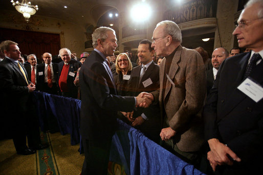 President George W. Bush greets audience members after addressing the American Enterprise Institute in Washington, D.C., Thursday, Feb. 15, 2007. "I recently announced a new strategy for Iraq -- it's a plan that demands more from the Iraqi government," said President Bush in his speech. "Not only do we demand more from the Iraqi government, but so do the Iraqi people demand more from the Iraqi government. They want to live in peace." White House photo by David Bohrer