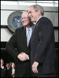 President George W. Bush shakes hands with Director of National Intelligence J. Michael “Mike” McConnell following McConnell’s ceremonial swearing-in Tuesday, Feb. 20, 2007 at Bolling Air Force Base in Washington, D.C. 