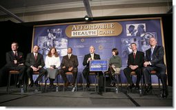 President George W. Bush answers a question from the audience at a forum on health care initiatives Wednesday, Feb. 21, 2007, at the Chattanooga Convention Center in Chattanooga, Tenn. President Bush is joined by panelist, from left to right, U.S. Sec. of Health and Human Services Michael O. Leavitt, Dr. Joseph Cofer, Martha Ginn, Will Smith, Amy Childers, Danny Jennings and Governor Phil Bredesen. White House photo by Paul Morse