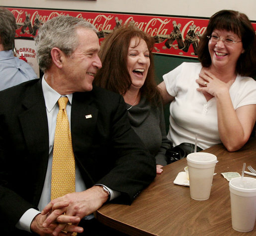 President George W. Bush visits with patrons of Porkers Bar-B-Que restaurant Wednesday, Feb. 21, 2007 in Chattanooga, Tenn., where President Bush stopped by for lunch after attending a forum on health care initiatives at the Chattanooga Convention Center. White House photo by Paul Morse