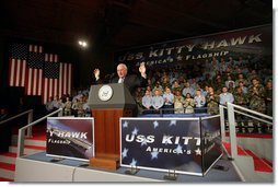 Vice President Dick Cheney waves in response to a welcome Wednesday, Feb. 21, 2007, from troops aboard the USS Kitty Hawk at Yokosuka Naval Base in Japan. White House photo by David Bohrer