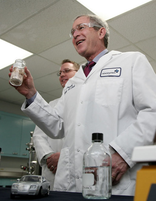 President George W. Bush holds a jar of spruce wood chips during a tour of the labs at Novozymes North America, Inc., Thursday, Feb. 22, 2007 in Franklinton, N.C., during a demonstration on how cellulosic ethanol can be produced from bio mass materials. White House photo by Paul Morse