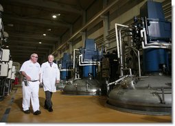 President George W. Bush is escorted on a tour of the fermentation room by David Pace at Novozymes North America, Inc., Thursday, Feb. 22, 2007 in Franklinton, N.C., where cellulosic ethanol is being produced from bio mass materials.  White House photo by Paul Morse