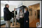 Mrs. Laura Bush talks with Mayor Connie Moran, architect Bruce Tolar, left, and project manager Micah Lewis, center, during a tour of Katrina Cottages, Thursday, Feb. 22, 2007 in Ocean Springs, Miss., the quaint, colorful and quickly built cottages for post-Katrina living. White House photo by Shealah Craighead