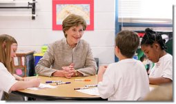 Mrs. Laura Bush participates in a discussion with children in a Boys & Girls Club program Thursday, Feb. 22, 2007 at the D’Iberville Elementary School in D’Iberville, Miss. White House photo by Shealah Craighead