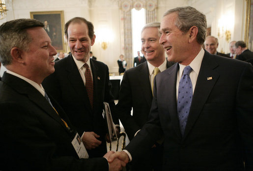 President George W. Bush shakes hands with Nebraska Governor Dave Heineman, left, joined by New York Governor Eliot Spitzer, center and Gov. Mike Easley of North Carolina, following a meeting with the National Governors Association in the State Dining Room of the White House, Monday, Feb. 26, 2007. White House photo by Eric Draper