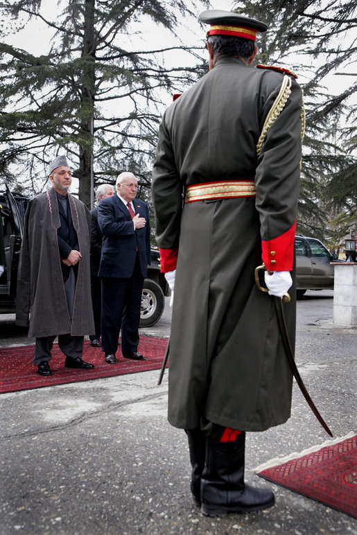 Vice President Dick Cheney stands with Afghan President Hamid Karzai, Tuesday, Feb. 27, 2007 during an arrival ceremony at the presidential palace in Kabul. The Vice President made an unannounced visit to Afghanistan to discuss regional issues and the global war on terror. White House photo by David Bohrer