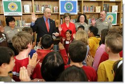 Mrs. Laura Bush and Interior Secretary Dirk Kempthorne swear in new Junior Rangers, students at Balboa Magnet Elementary School Wednesday, Feb. 28, 2007, in Northridge, Calif. The National Park Service Junior Ranger program provides activities in parks and partnering schools to teach young people about America's National Parks. White House photo by Shealah Craighead