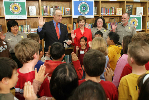 Mrs. Laura Bush and Interior Secretary Dirk Kempthorne swear in new Junior Rangers, students at Balboa Magnet Elementary School Wednesday, Feb. 28, 2007, in Northridge, Calif. The National Park Service Junior Ranger program provides activities in parks and partnering schools to teach young people about America's National Parks. White House photo by Shealah Craighead