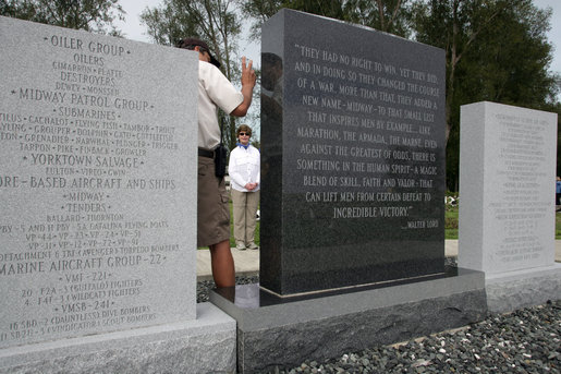 Mrs. Laura Bush visits the Battle of Midway Memorial on the parade grounds of Midway Island Thursday, March 1, 2007. Midway Atoll was the site of the World War II Battle of Midway on June 4, 1942. The U.S. Navy defeated a Japanese attack against Midway Islands, marking a turning point in the war in the pacific theater. White House photo by Shealah Craighead