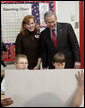 President George W. Bush meets with teacher Teri Sanders and students of her fifth grade U.S. History class at the Silver Street Elementary School in New Albany, Ind., Friday, March 2, 2007. White House photo by Eric Draper