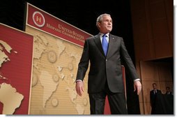 President George W. Bush pauses to acknowledge the applause of the audience following his remarks to United States Hispanic Chamber of Commerce, speaking on Western Hemisphere policy, Monday, March 5, 2007 in Washington, D.C. White House photo by Paul Morse