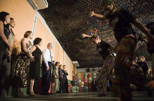 President George W. Bush looks on during a performance Friday, March 9, 2007, at Meninos do Morumbi in Sao Paulo. The President and Mrs. Laura Bush visited the center that offers youth alternatives to drugs and crime during their one-day visit to the Brazilian city. White House photo by Paul Morse